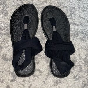 black Sanuk sandals